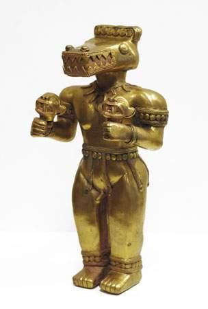 Statuette anthropozoomorphe en métal doré...