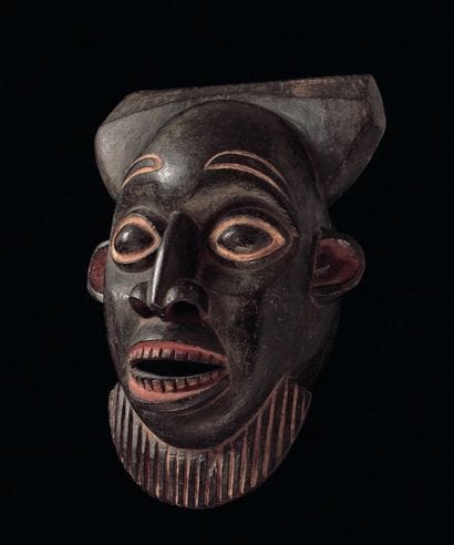 Masque représentant un dignitaire aux traits...