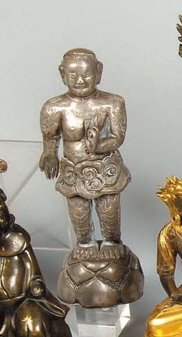 Bouddha enfant Vietnam Argent ciselé et repoussé....