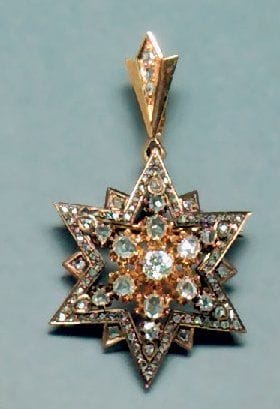 Pendentif en or jaune en forme d'étoile à...