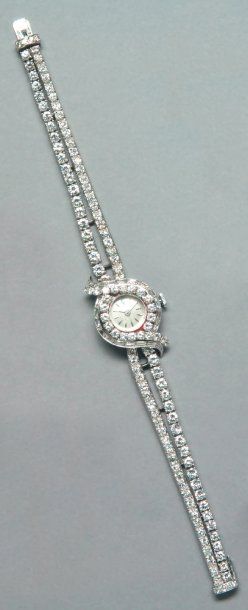 Montre bracelet de dame en platine et or...