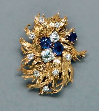 Clip de corsage en or jaune et platine stylisé...