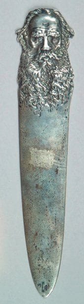 Coupe papier en argent ciselé d'une tête...