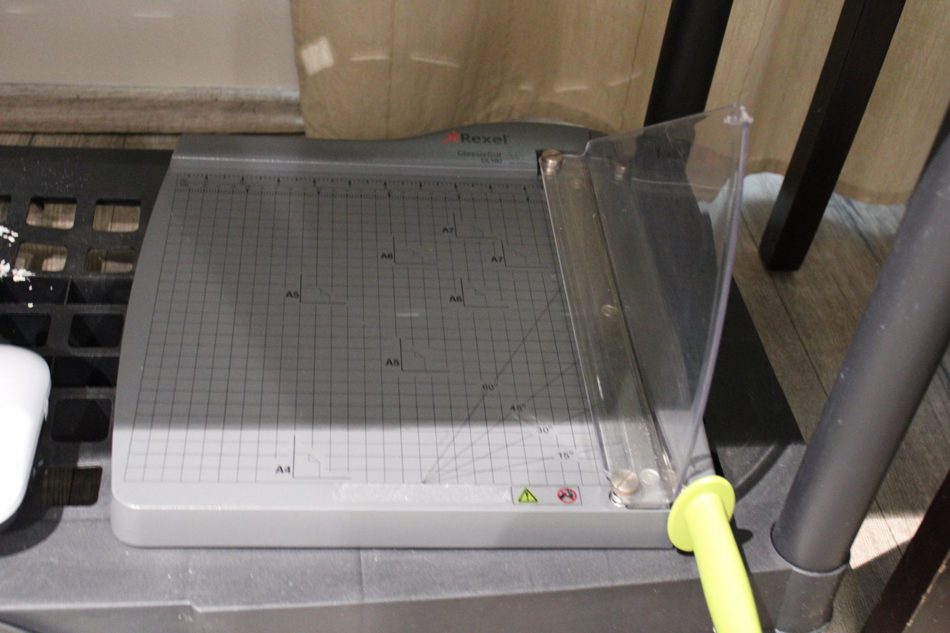 Null REXEL paper cutter and a PEACH PL750 laminator.