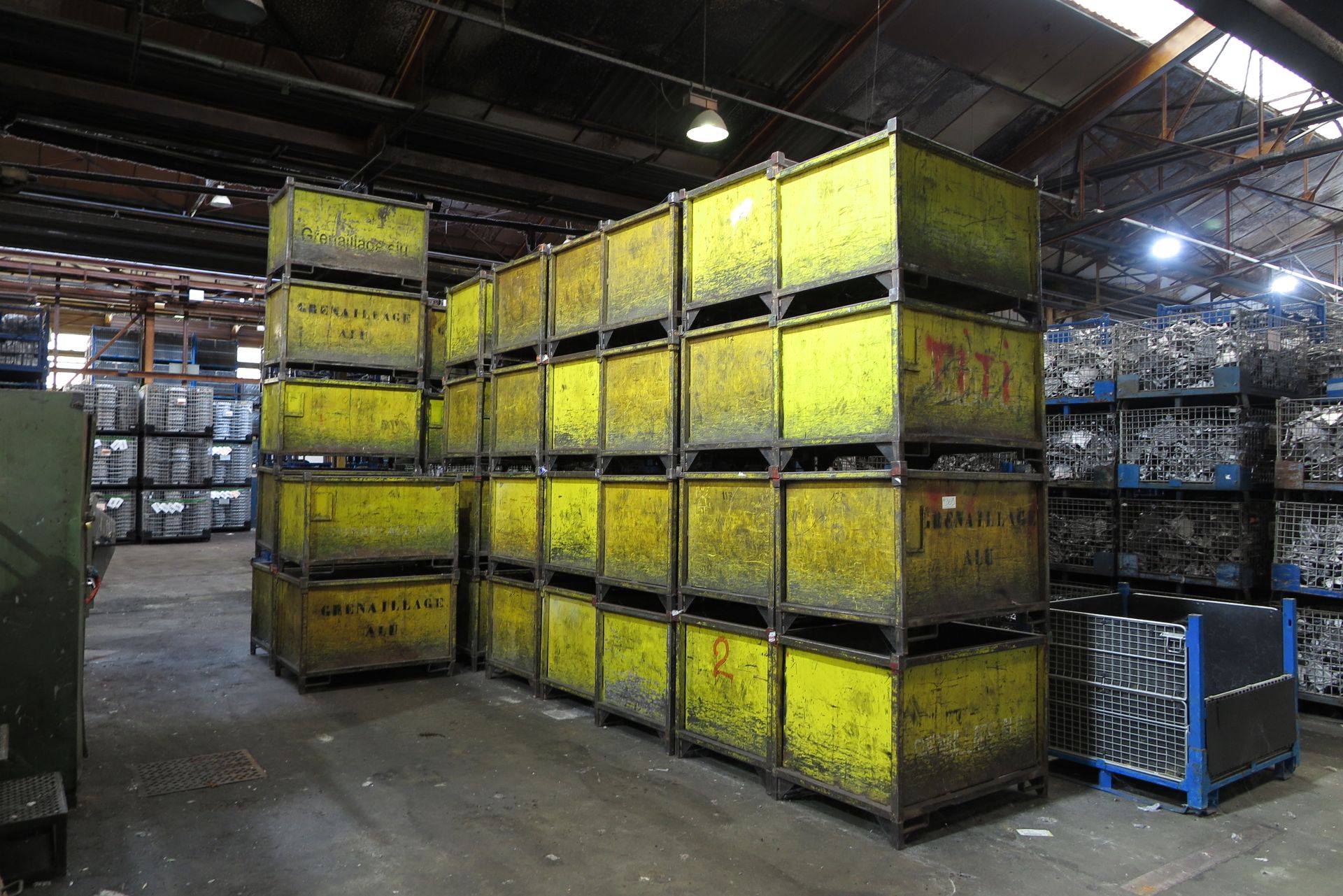 Null Set of about 35 yellow shot-blasted metal boxes