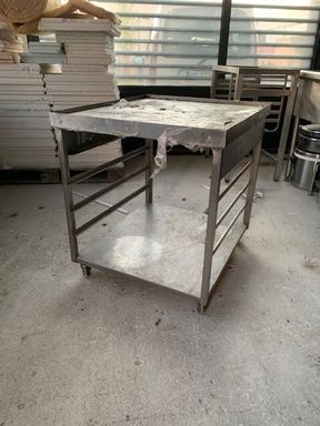 Null Stainless steel worktop with shelves