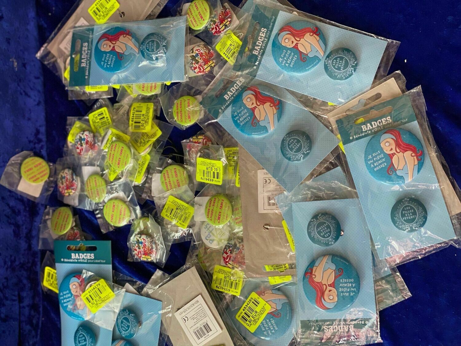 Null Set of 35 pin badges in blister packs