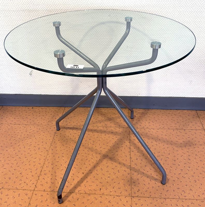 Null 1 UNIT: CIRCULAR TABLE WITH GLASS TOP RESTING ON A GREY LACQUERED TUBULAR S&hellip;