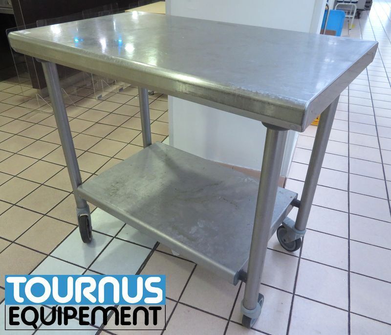 Null PREPARATION TABLE ON WHEELS WITH 2 STAINLESS STEEL TRAYS TOURNUS EQUIPMENT.&hellip;