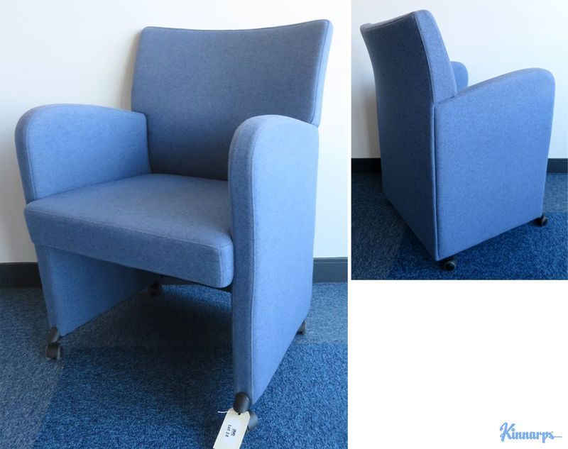 Null ARMCHAIR ON CASTERS OF BRAND KINNARPS COVERED WITH LIGHT BLUE CHINA FABRIC.&hellip;