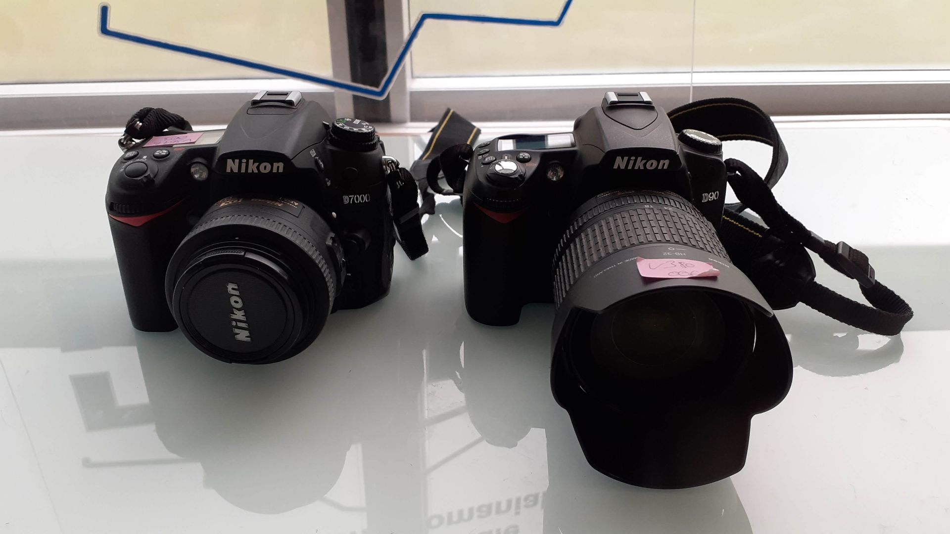 Null Lot de 2 appareils photo reflex NIKON non testés :


	 - D7000 avec objecti&hellip;