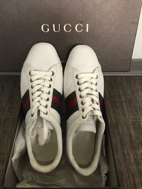 Null Set in used condition consisting of:
- GUCCI. Pair of white sneakers, mocca&hellip;