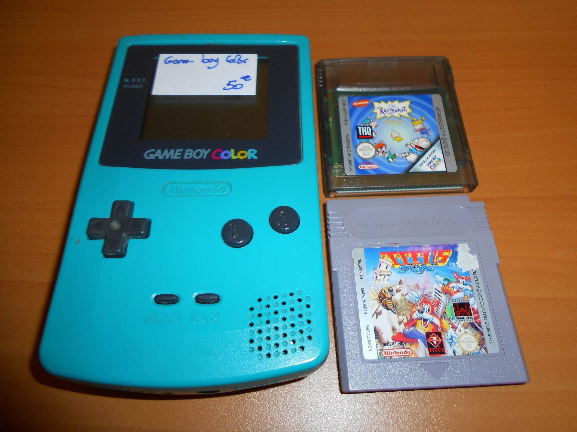 Null A Nintendo GameBoy Color portable video game system, blue, with Titus Fox a&hellip;
