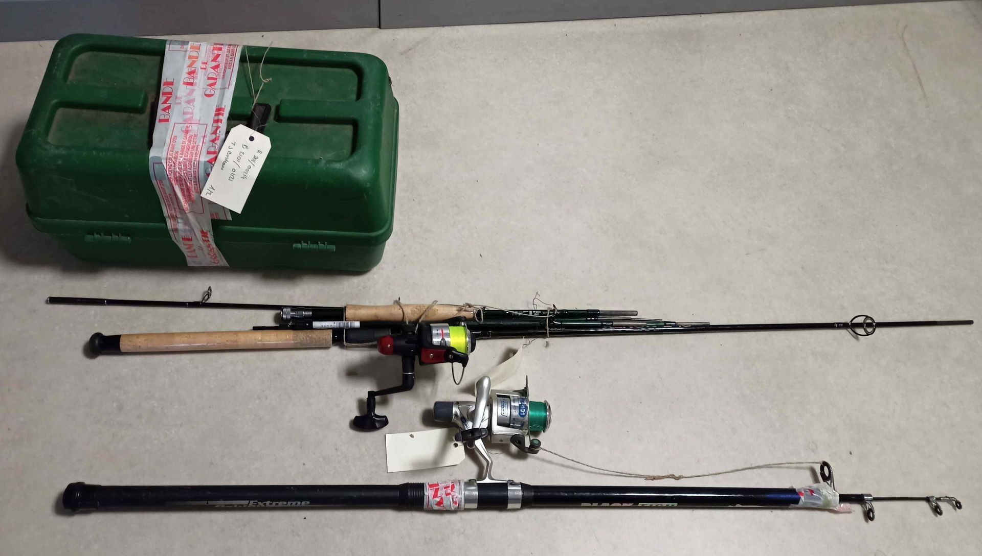 Null 
Lot including 3 fishing rods: 

- BLACK FISH, with reel ATOMIC 401, 

- NE&hellip;