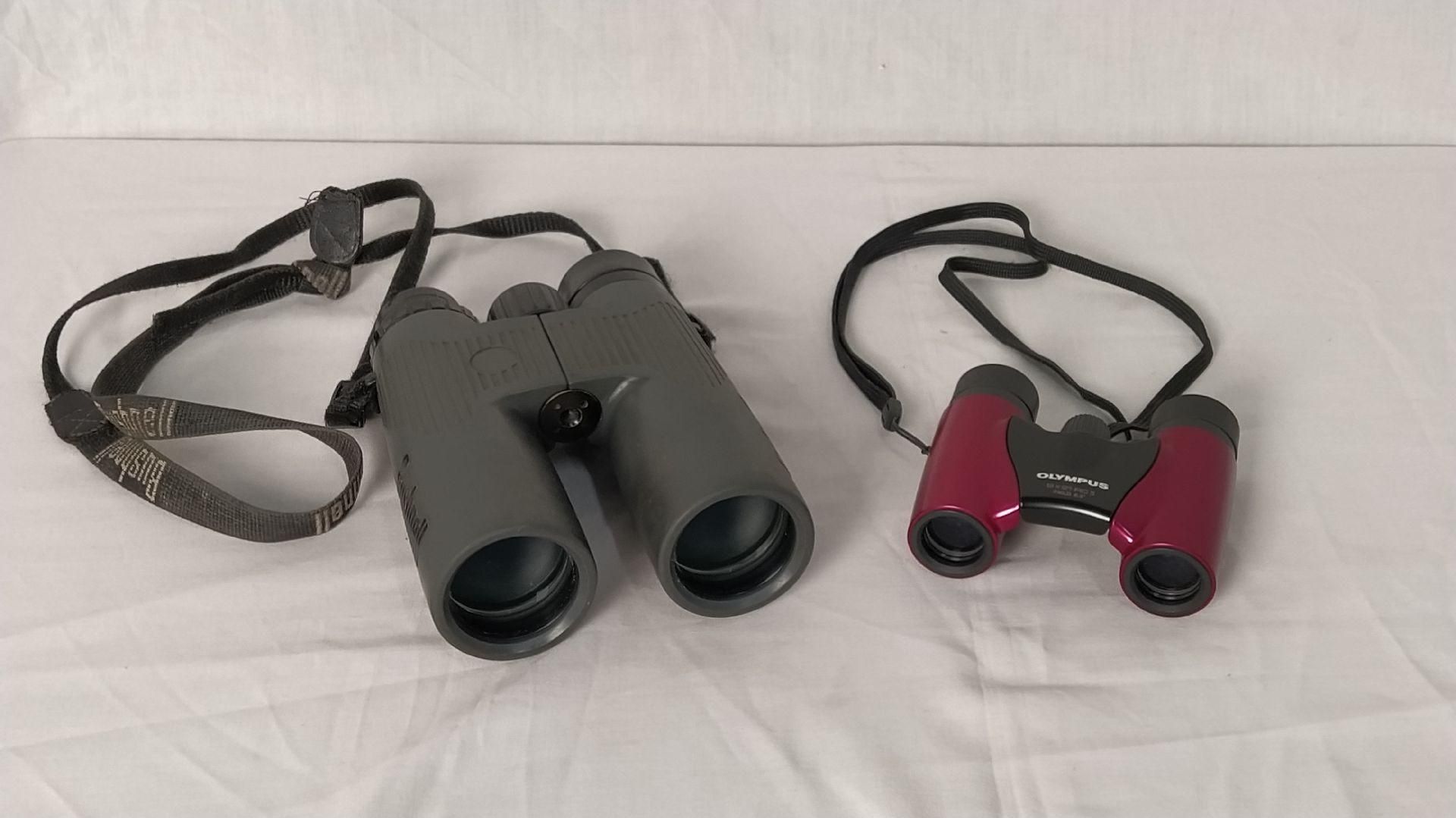 Null Set of 2 binoculars including:
-BUSHNELL Nature View 8x42 FOV 330FT
-OLYMPU&hellip;