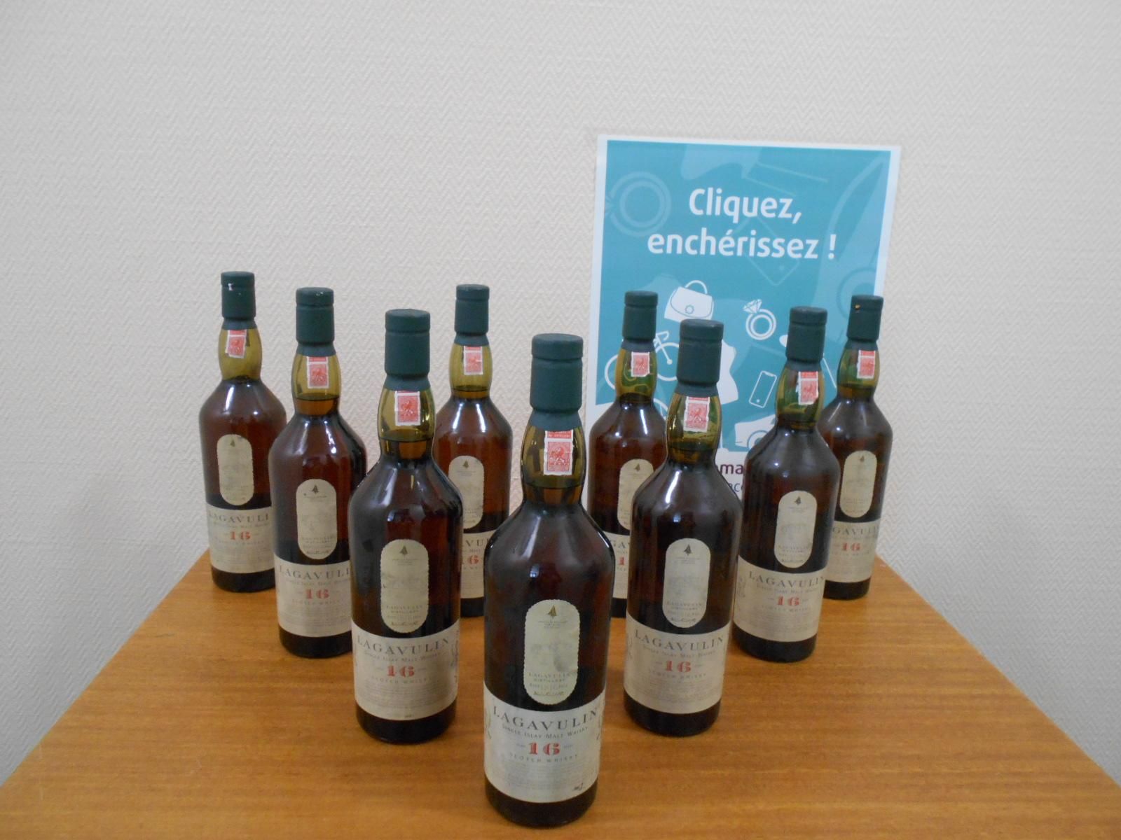Null 
	 Lot of 9 bottles of LAGAVULIN Scotch Whisky - 16 years old. Distilled an&hellip;