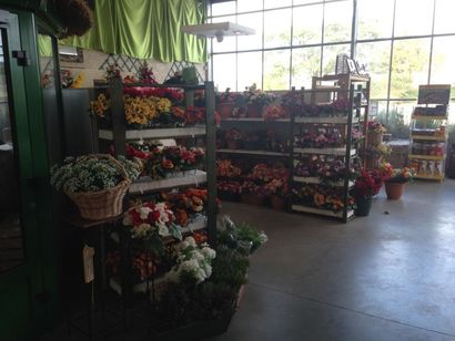 null Marchandises composées de plantes vertes, de fleurs artificielles, d'alimentation...