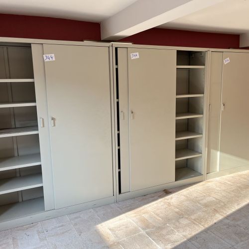 Null Three large metal cabinets with sliding doors