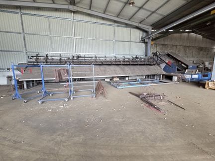 Une cadreuse de marque EVG RAXE diamètre 16 avec tunnel en état d'usage avancé