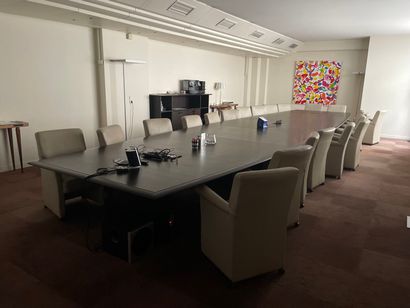 1 table seating 24
22 fawn leather armchairs...