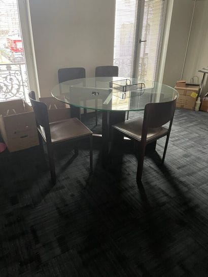 1 marble-top desk
1 round glass-top table
4...