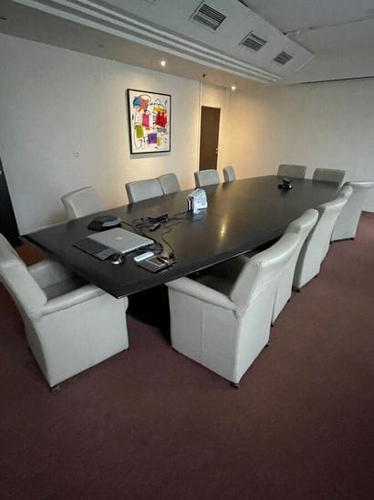 1 table
12 fawn leather armchairs on castors
1...