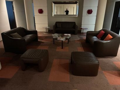 3 brown leather sofas
2 brown leather poufs
3...