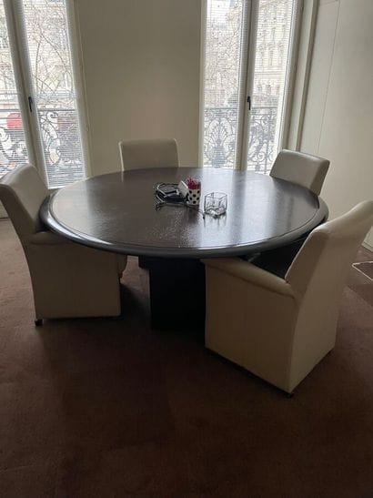 1 table 
4 tan leather armchairs on castors
1...