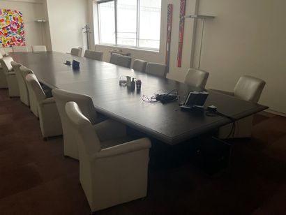 1 table seating 24
22 fawn leather armchairs...